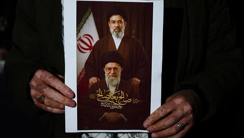 BAGHDAD, IRAQ - MARCH 09: A group gathers to hold a support demonstration for Mojtaba Khamenei, who has become Irans new religious leader following the death of Ayatollah Ali Khamenei in a US-Israel airstrike in Baghdad, Iraq on March 09, 2026. (Photo by Murtadha Al-Sudani/Anadolu via Getty Images)