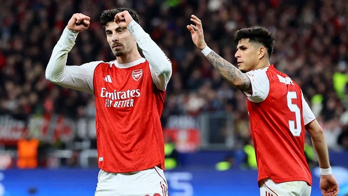 Soccer Football - UEFA Champions League - Round 16 - First Leg - Bayer Leverkusen v Arsenal - BayArena, Leverkusen, Germany - March 11, 2026 Arsenals Kai Havertz celebrates scoring their first goal with Piero Hincapie REUTERS/Wolfgang Rattay     TPX IMAGES OF THE DAY