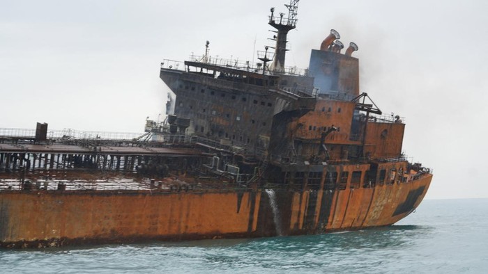 A foreign tanker carrying Iraqi fuel oil damaged after catching fire in Iraqs territorial waters, following unidentified attacks that targeted two foreign tankers, according to Iraqi port officials, near Basra, Iraq, March 12, 2026.  REUTERS/Mohamme