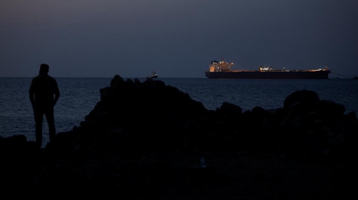 The Parnassos crude oil tanker sits anchored as the traffic is down in the Strait of Hormuz, amid the U.S.-Israeli conflict with Iran, in Muscat, Oman, March 10, 2026. REUTERS/Benoit Tessier