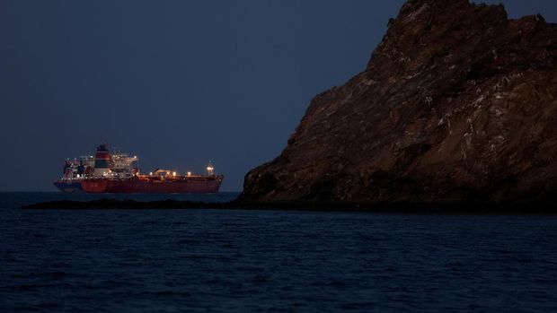 The Parnassos crude oil tanker sits anchored as the traffic is down in the Strait of Hormuz, amid the U.S.-Israeli conflict with Iran, in Muscat, Oman, March 10, 2026. REUTERS/Benoit Tessier