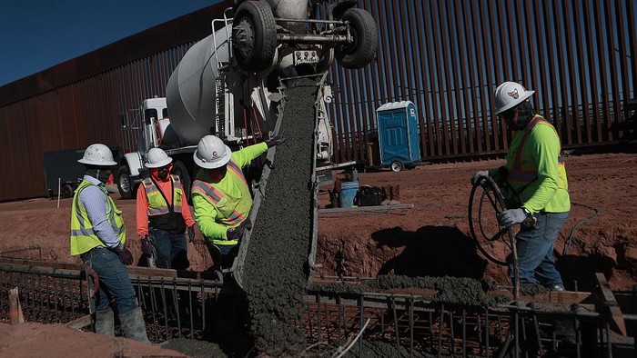 CIUDAD JUAREZ, MEXICO - MARCH 11: Construction continues on a new section of the border wall between Santa Teresa, New Mexico, and Ciudad Juarez, Mexico, on March 11, 2026. Workers install cement bases and steel rods as part of the ongoing project to reinforce the barrier along the international border. (Photo by Christian Torres/Anadolu via Getty Images)