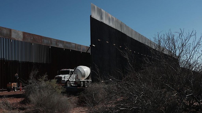 CIUDAD JUAREZ, MEXICO - MARCH 11: Construction continues on a new section of the border wall between Santa Teresa, New Mexico, and Ciudad Juarez, Mexico, on March 11, 2026. Workers install cement bases and steel rods as part of the ongoing project to reinforce the barrier along the international border. (Photo by Christian Torres/Anadolu via Getty Images)