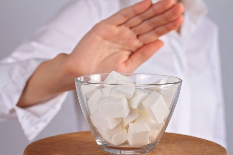 Woman refuses white sugar. Dieting, Health care and diabetes prevention concept