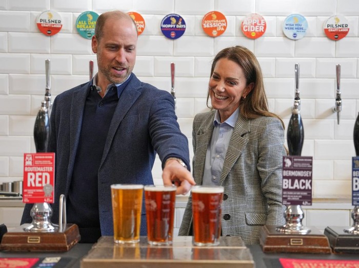 Britains Kate, Princess of Wales, and Prince William stand near beers as they visit the Southwark Brewing Company at the Bermondsey Beer Mile in London, Thursday, March 12, 2026.    Kin Cheung/Pool via REUTERS