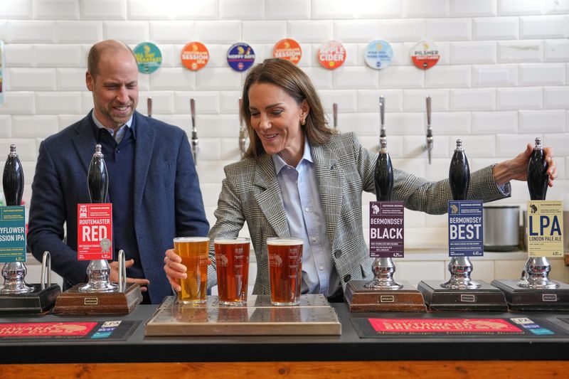 Britain's Kate, Princess of Wales, and Prince William stand near beers as they visit the Southwark Brewing Company at the Bermondsey Beer Mile in London, Thursday, March 12, 2026.    Kin Cheung/Pool via REUTERS
