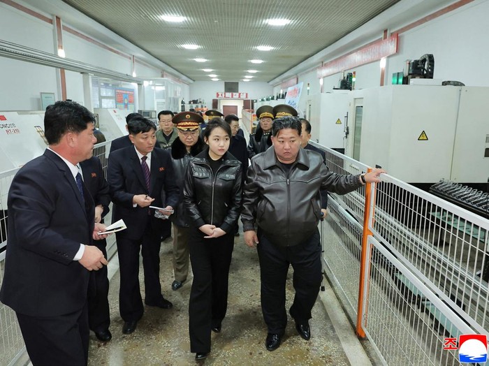 Kim Ju Ae, daughter of North Korean leader Kim Jong Un, holds a pistol as she and her father visit a munitions factory in Pyongyang, North Korea, in this picture released on March 12, 2026, by North Koreas official Korean Central News Agency. KCNA via REUTERS    ATTENTION EDITORS - THIS IMAGE WAS PROVIDED BY A THIRD PARTY. REUTERS IS UNABLE TO INDEPENDENTLY VERIFY THIS IMAGE. NO THIRD PARTY SALES. SOUTH KOREA OUT. NO COMMERCIAL OR EDITORIAL SALES IN SOUTH KOREA.     TPX IMAGES OF THE DAY