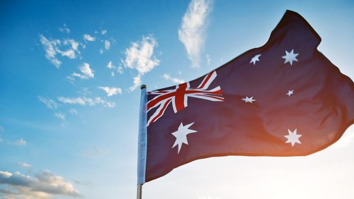 Waving Australia flag in the air.