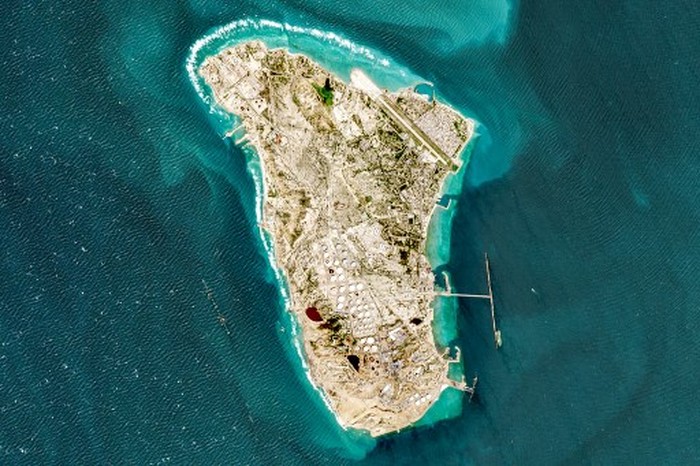 This handout image taken by the European Space Agency (ESA) captured by the Copernicus Sentinel-2 satellite shows a view of Irans Kharg Island, which hosts the countrys main crude export terminal and is responsible for the overwhelming majority of its oil shipments to the world, about 30 kilometres south of the mainland in the north of the Gulf, on March 2, 2026. The US and Israel have previously treaded carefully around the island in the conflict, but an Axios report over the weekend cited Trump administration officials saying capturing Kharg was on the table. The island handles roughly 90 percent of Irans crude exports, according to a JP Morgan note released on March 8. (Photo by EUROPEAN SPACE AGENCY / AFP) / RESTRICTED TO EDITORIAL USE - MANDATORY CREDIT AFP PHOTO / ESA - HANDOUT - NO MARKETING NO ADVERTISING CAMPAIGNS - DISTRIBUTED AS A SERVICE TO CLIENTS