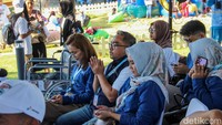 Ribuan peserta mengikuti program Mudik Bareng 2026 yang digelar Pertamina di kawasan Taman Mini Indonesia Indah, Jakarta, Minggu (15/3/2026).