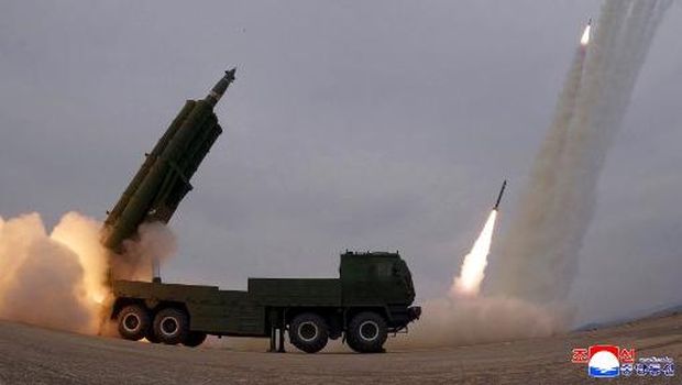 This picture taken on March 14, 2026 and released by North Korea's official Korean Central News Agency (KCNA) via KNS on March 15, 2026 shows a training exercise of North Korean Army's 600mm-calibre ultra-precision multiple rocket launchers, at an undisclosed location in North Korea. (Photo by KCNA VIA KNS / AFP) / South Korea OUT / ---EDITORS NOTE--- RESTRICTED TO EDITORIAL USE - MANDATORY CREDIT 