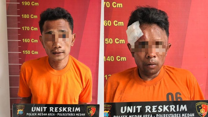 Kedua pelaku saat diamankan di kantor polisi. (dok. Polsek Medan Area)