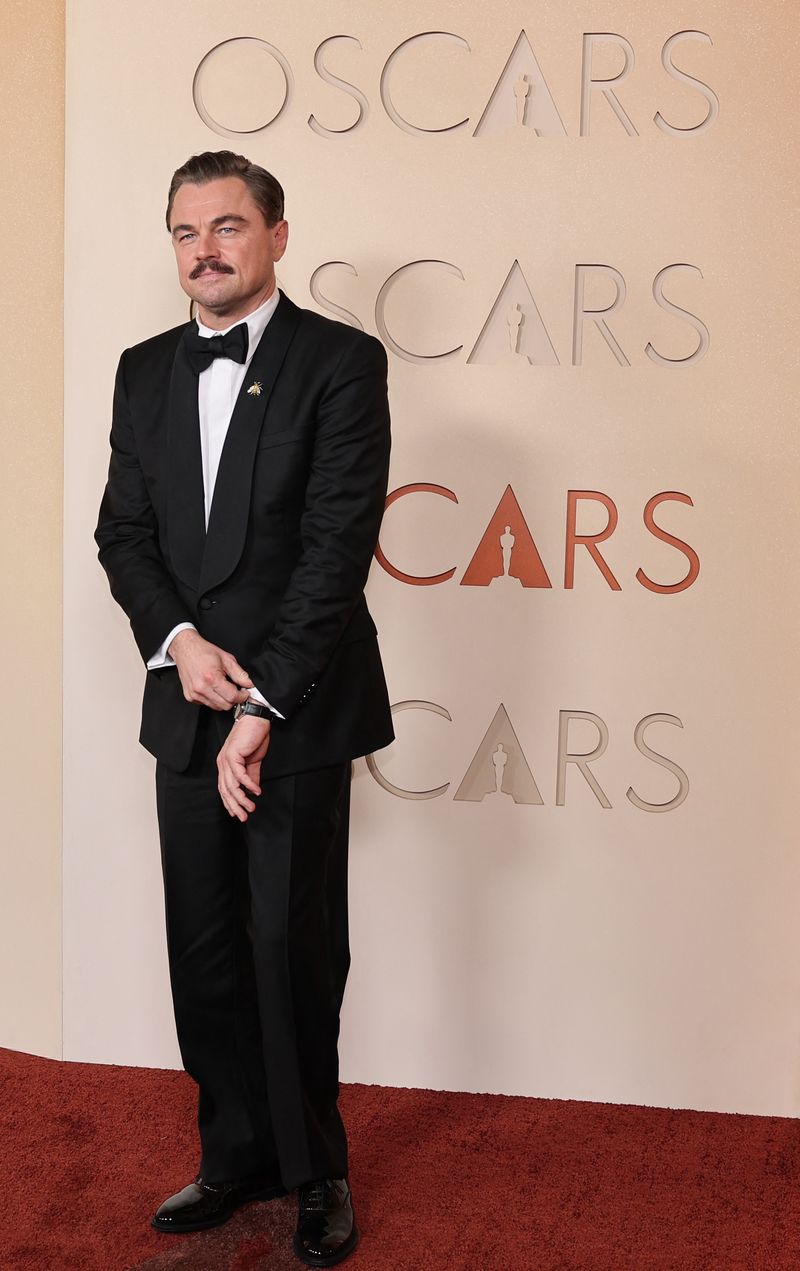 Leonardo DiCaprio poses on the red carpet during the Oscars arrivals at the 98th Academy Awards in Hollywood, Los Angeles, California, U.S., March 15, 2026. REUTERS/Daniel Cole