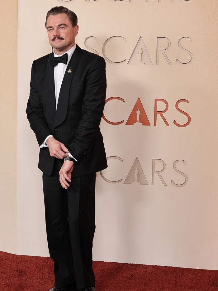 Leonardo DiCaprio poses on the red carpet during the Oscars arrivals at the 98th Academy Awards in Hollywood, Los Angeles, California, U.S., March 15, 2026. REUTERS/Daniel Cole