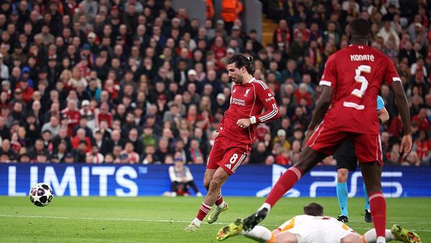 Liverpool vs Galatasaray LIVERPOOL, ENGLAND - MARCH 18: Dominik Szoboszlai of Liverpool scores his team's first goal during the UEFA Champions League 2025/26 Round of 16 Second Leg match between Liverpool FC and Galatasaray SK at Anfield on March 18, 2026 in Liverpool, England. (Photo by Alex Pantling - UEFA/UEFA via Getty Images)