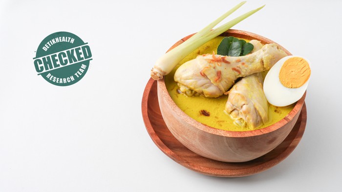 Ilustrasi opor ayam dengan trik pengolahan yang ramah kolesterol, untuk kolom gizi.