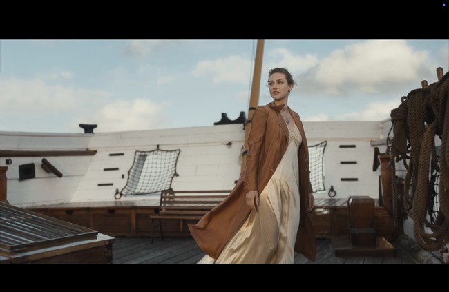 Video klip dimulai dengan adegan Lili Reinhart melihat sebuah kapal di museum, lalu terbangun di kapal yang dikendalikan ketujuh personel BTS, RM, Jin, Suga, J-Hope, Jimin, V, dan Jungkook. Foto: dok. HYBE Labels