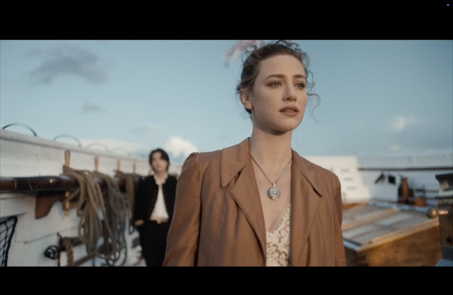 Sepanjang perjalanan, karakter Lili Reinhart menghadapi keraguan dan kesedihan. Namun, ada personel BTS hadir sebagai support system. Foto: dok. HYBE Labels