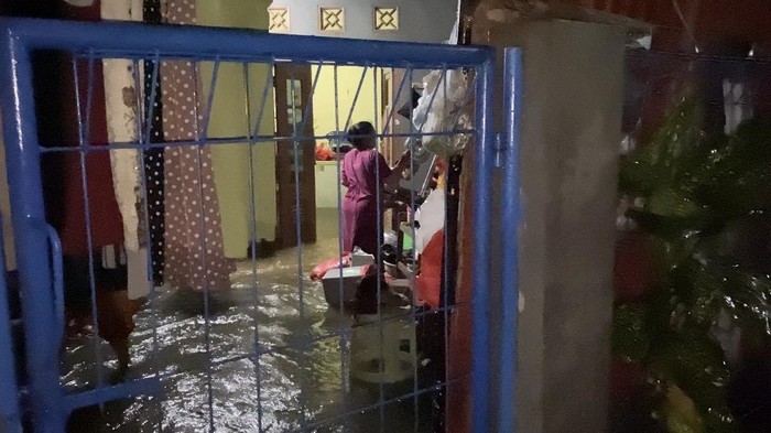 Banjir di Jalan Gotong Royong, Setu Pedongkelan, RT 08/ RW 05 Tugu, Cimanggis, Depok, Sabtu (21/3/2026).