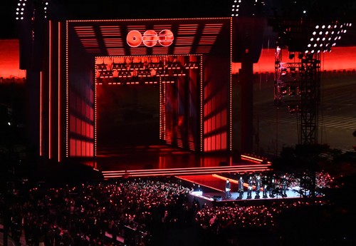 SEOUL, SOUTH KOREA - MARCH 21: (EDITORIAL USE ONLY) K-pop boy band BTS perform onstage during comeback concert at Gwanghwamun Square on March 21, 2026 in Seoul, South Korea. The free concert is the band's first performance in nearly four years. (Photo by Kim Hong-Ji - Pool/Getty Images)