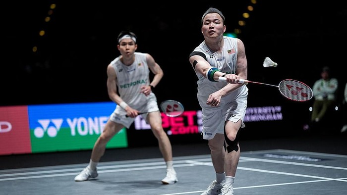 BIRMINGHAM, ENGLAND - MARCH 08: Aaron Chia (R) and Soh Wooi Yik of Malaysia compete in the Mens Doubles Final match against Kim Won Ho and Seo Seung Jae of Korea during day six of Yonex All England Open at Utilita Arena on March 08, 2026 in Birmingh