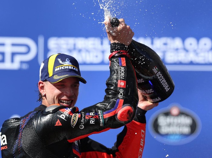 MotoGP - Brazil Grand Prix - Autodromo Internacional Ayrton Senna, Goiania, Brazil - March 22, 2026 Aprilia Racings Marco Bezzecchi celebrates on the podium after winning the Brazil Grand Prix REUTERS/Adriano Machado