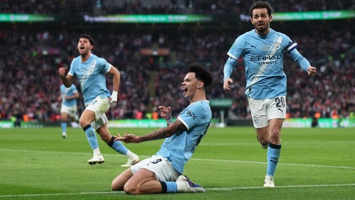 Soccer Football - Carabao Cup - Final - Arsenal v Manchester City - Wembley Stadium, London, Britain - March 22, 2026 Manchester Citys Nico OReilly celebrates scoring their first goal with Bernardo Silva Action Images via Reuters/Paul Childs EDITORIAL USE ONLY. NO USE WITH UNAUTHORIZED AUDIO, VIDEO, DATA, FIXTURE LISTS, CLUB/LEAGUE LOGOS OR LIVE SERVICES. ONLINE IN-MATCH USE LIMITED TO 120 IMAGES, NO VIDEO EMULATION. NO USE IN BETTING, GAMES OR SINGLE CLUB/LEAGUE/PLAYER PUBLICATIONS. PLEASE CONTACT YOUR ACCOUNT REPRESENTATIVE FOR FURTHER DETAILS..