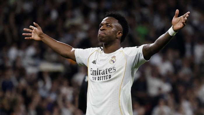 Soccer Football - LaLiga - Real Madrid v Atletico Madrid - Santiago Bernabeu, Madrid, Spain - March 22, 2026 Real Madrids Vinicius Junior celebrates scoring their third goal REUTERS/Jon Nazca