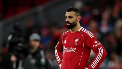 Soccer Football - Premier League - Liverpool v Tottenham Hotspur - Anfield, Liverpool, Britain - March 15, 2026 Liverpools Mohamed Salah looks dejected after the match REUTERS/Phil Noble EDITORIAL USE ONLY. NO USE WITH UNAUTHORIZED AUDIO, VIDEO, DATA, FIXTURE LISTS, CLUB/LEAGUE LOGOS OR LIVE SERVICES. ONLINE IN-MATCH USE LIMITED TO 120 IMAGES, NO VIDEO EMULATION. NO USE IN BETTING, GAMES OR SINGLE CLUB/LEAGUE/PLAYER PUBLICATIONS. PLEASE CONTACT YOUR ACCOUNT REPRESENTATIVE FOR FURTHER DETAILS..