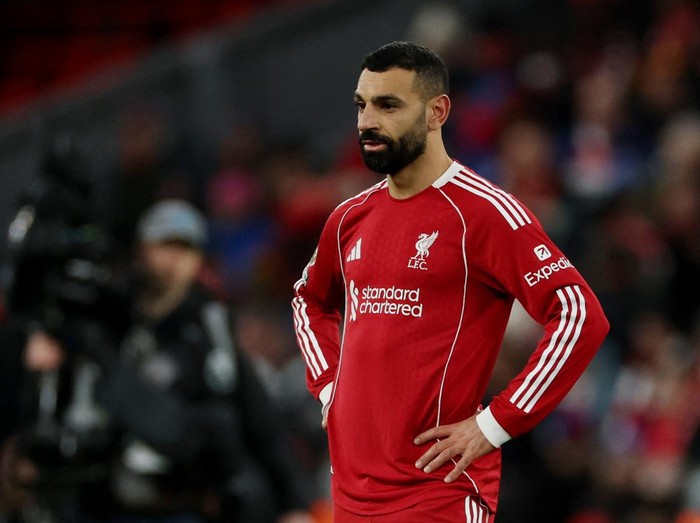 Soccer Football - Premier League - Liverpool v Tottenham Hotspur - Anfield, Liverpool, Britain - March 15, 2026 Liverpools Mohamed Salah looks dejected after the match REUTERS/Phil Noble EDITORIAL USE ONLY. NO USE WITH UNAUTHORIZED AUDIO, VIDEO, DATA, FIXTURE LISTS, CLUB/LEAGUE LOGOS OR LIVE SERVICES. ONLINE IN-MATCH USE LIMITED TO 120 IMAGES, NO VIDEO EMULATION. NO USE IN BETTING, GAMES OR SINGLE CLUB/LEAGUE/PLAYER PUBLICATIONS. PLEASE CONTACT YOUR ACCOUNT REPRESENTATIVE FOR FURTHER DETAILS..