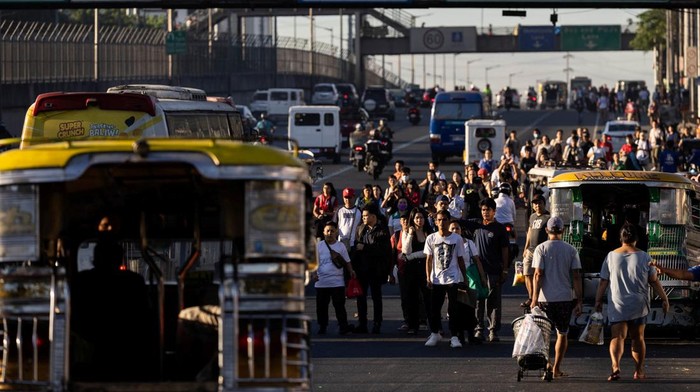Jeepney drivers stage a rally during their 2-day strike to protest over rising fuel prices amid the U.S.-Israeli conflict with Iran, in Quezon City, Philippines, March 26, 2026. REUTERS/Eloisa Lopez