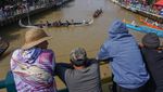 Meriah, Lomba Balap Perahu Dayung Tradisional Warnai Tradisi Syawalan di Batang