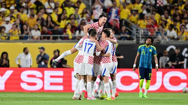 ORLANDO, FLORIDA - MARCH 26: Luka Vuskovic of Croatia celebrates scoring his team's first goal with teammates during the international friendly match between Colombia and Croatia at Camping World Stadium on March 26, 2026 in Orlando, Florida. (Photo by Julio Aguilar/Getty Images)