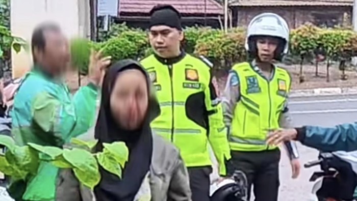 Pengemudi ojol diduga memukul di Palembang hingga berdarah