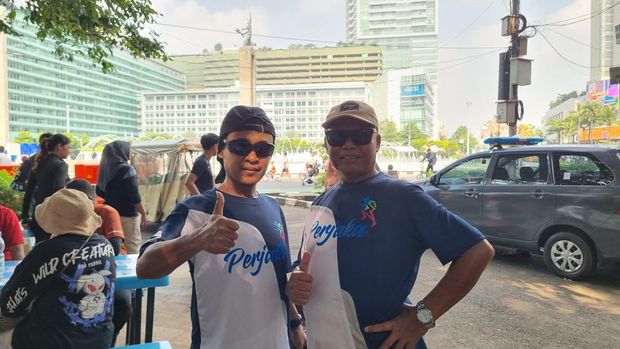 Muji (kiri), Soleh (kanan) memilih olahraga di CFD untuk bakar lemak selama libur Lebaran.