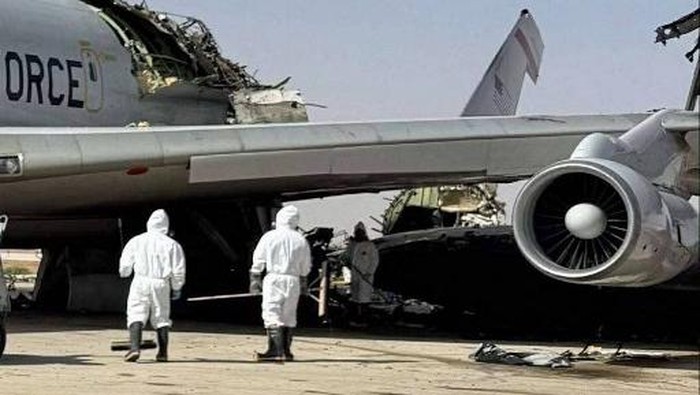 A damaged U.S. Boeing E-3 Sentry airborne warning and control aircraft following an Iranian strike on the airbase, amid the U.S.-Israeli conflict with Iran, at Prince Sultan Air Base in Saudi Arabia  in this picture obtained from social media released on March 29, 2026. SOCIAL MEDIA/via REUTERS  THIS IMAGE HAS BEEN SUPPLIED BY A THIRD PARTY. NO RESALES. NO ARCHIVES. BEST QUALITY AVAILABLE.  VERIFICATION: Reuters was able to confirm the location by the runway layout, buildings, utility towers and terrain seen in the photographs which matched satellite imagery of the area. The plane design and markings matched file imagery of E-3 AWACS aircraft. A U.S. official confirmed to Reuters that an E3 was damaged in a strike on the airbase on March 27. Same model aircraft is seen undamaged in the same position on the tarmac in satellite imagery from March 11. Satellite imagery from March 29 shows what appears to be a blackened section of the tarmac in the same position where the damaged plane is visible in the photographs. Exact date when the photographs were taken could not be verified but no older versions of the photographs were found posted online before March 29.     TPX IMAGES OF THE DAY