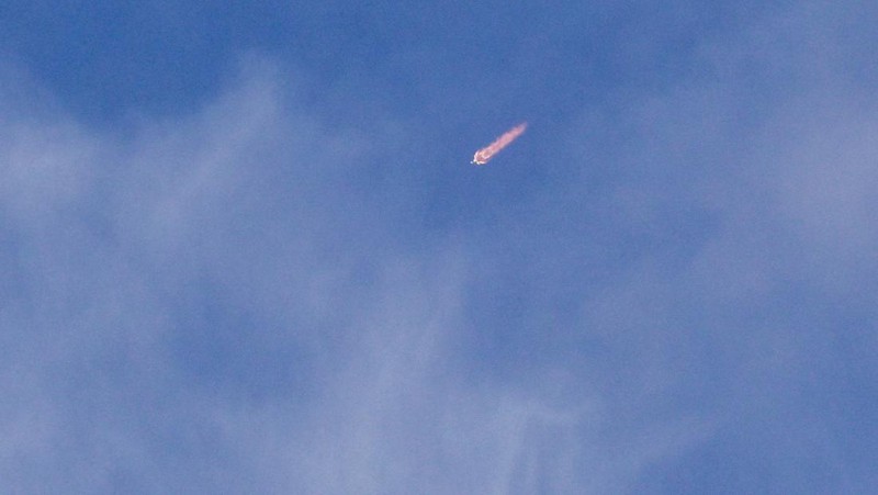 Photographers watch a SpaceX Falcon 9 rocket lift off from the Cape Canaveral Space Force Station with a payload of 29 Starlink satellites in Cape Canaveral, Florida, U.S., March 30, 2026. It was the booster's record-breaking 34th flight. REUTERS/Steve Nesius