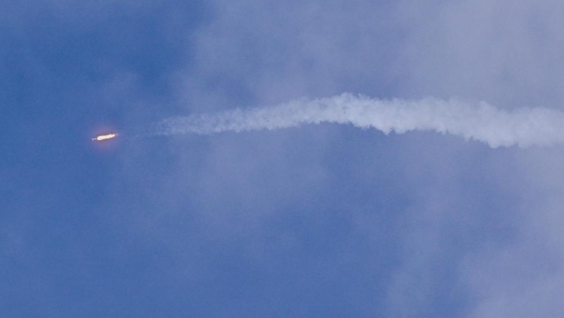 Photographers watch a SpaceX Falcon 9 rocket lift off from the Cape Canaveral Space Force Station with a payload of 29 Starlink satellites in Cape Canaveral, Florida, U.S., March 30, 2026. It was the booster's record-breaking 34th flight. REUTERS/Steve Nesius