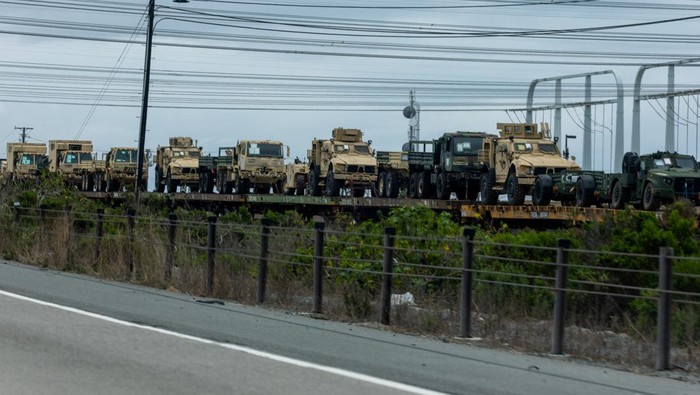 A train transporting U.S. military equipment travels through Camp Pendleton in California, U.S., March 31, 2026. REUTERS/Mike Blake