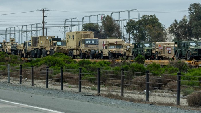 A train transporting U.S. military equipment travels through Camp Pendleton in California, U.S., March 31, 2026. REUTERS/Mike Blake