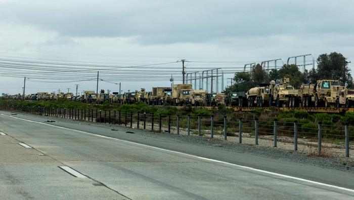 A train transporting U.S. military equipment travels through Camp Pendleton in California, U.S., March 31, 2026. REUTERS/Mike Blake