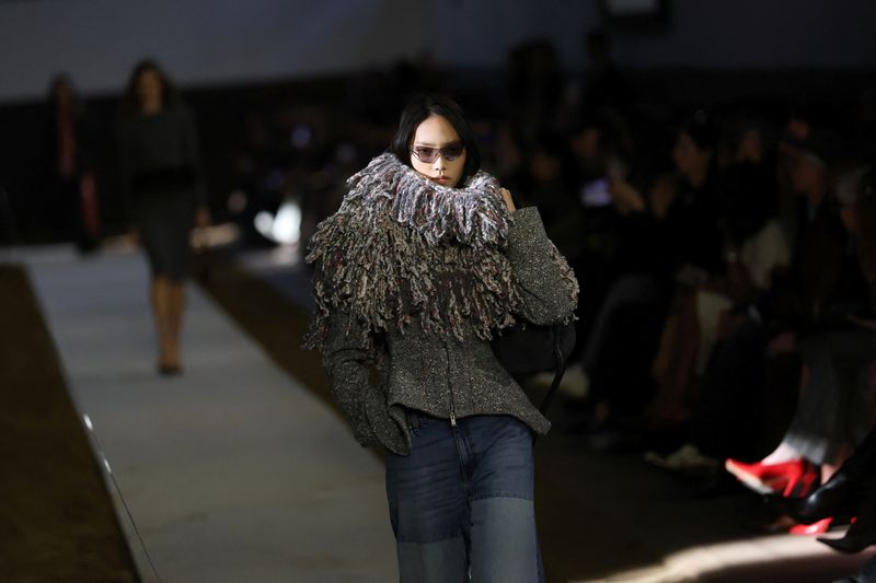 A model presents a creation by designer Stella McCartney as part of her Fall/Winter 2026/2027 Women's ready-to-wear collection show during Paris Fashion Week in Paris, March 4, 2026. REUTERS/Stephane Mahe