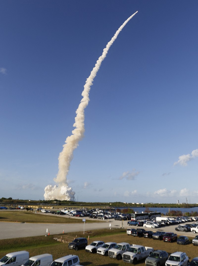 NASA's Artemis II mission to fly by the moon, comprising of the Space Launch System (SLS) rocket with the Orion crew capsule, soars into the sky from the Kennedy Space Center in Cape Canaveral, Florida, U.S., April 1, 2026. REUTERS/Joe Skipper