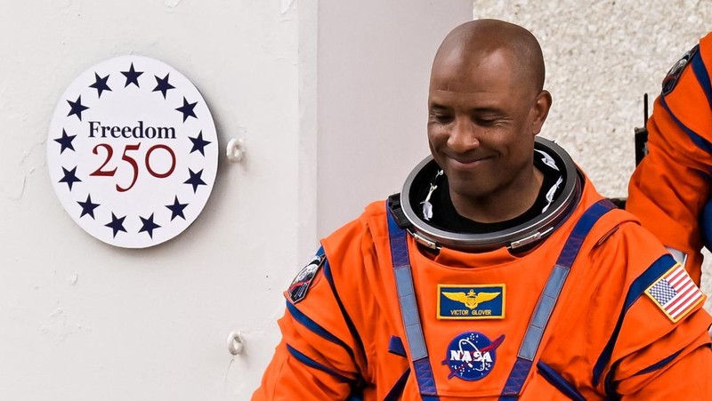 NASA astronaut Victor Glover reacts before boarding the astronaut van with the crew of the Artemis II launch mission to fly by the moon, NASA astronauts Reid Wiseman and Christina Koch and CSA (Canadian Space Agency) astronaut Jeremy Hansen, before heading to launch pad 39B at the Kennedy Space Center in Cape Canaveral, Florida, U.S. April 1, 2026.  REUTERS/Steve Nesius