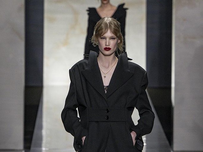 MILAN, ITALY - FEBRUARY 28: A model walks the runway at the Dolce & Gabbana Ready to Wear Fall/Winter 2026/2027 fashion show during the Milan Fashion Week on February 28, 2026 in Milan, Italy. (Photo by Victor VIRGILE/Gamma-Rapho via Getty Images)