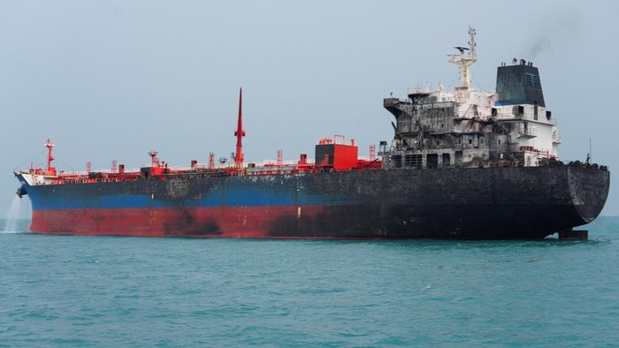 A foreign tanker carrying Iraqi fuel oil damaged after catching fire in Iraqs territorial waters, following unidentified attacks that targeted two foreign tankers, according to Iraqi port officials, near Basra, Iraq, March 12, 2026.  REUTERS/Mohamme