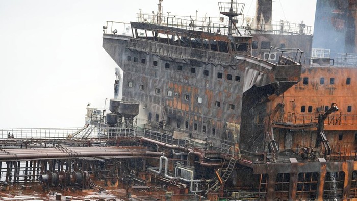 A foreign tanker carrying Iraqi fuel oil damaged after catching fire in Iraq's territorial waters, following unidentified attacks that targeted two foreign tankers, according to Iraqi port officials, near Basra, Iraq, March 12, 2026.  REUTERS/Mohammed Aty