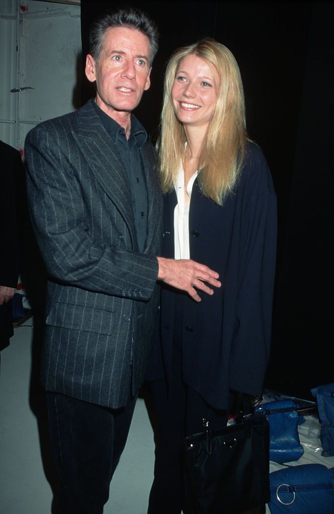 (Original Caption) : 1996-New York, New York: Picture shows desinger, Calvin Kelin, and actress, Gwyneth Paltrow, backstage at the Calvin Klein fall fashion show.   (Photo by Mitchell Gerber/Corbis/VCG via Getty Images)