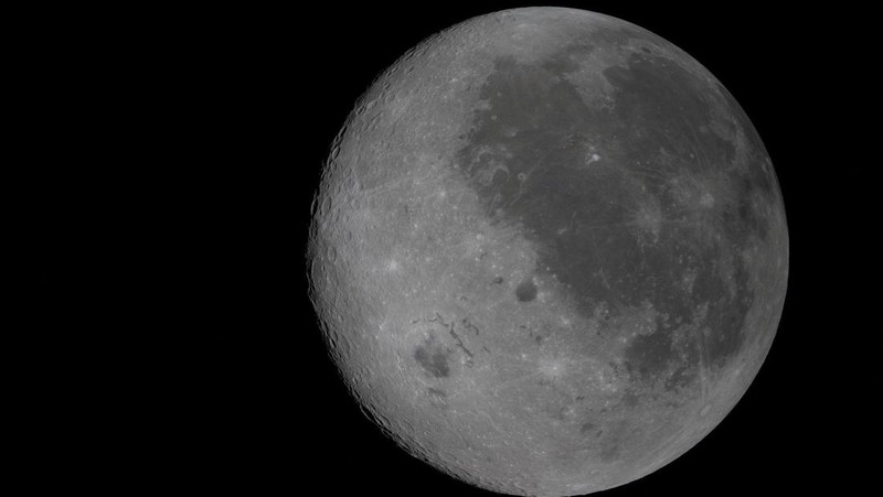 A view of the Moon and the Earth as the Artemis II mission's Orion spacecraft approaches to reach its furthest distance from Earth, in this screengrab taken from a livestream video on April 6, 2026. NASA/Handout via REUTERS    THIS IMAGE HAS BEEN SUPPLIED BY A THIRD PARTY.