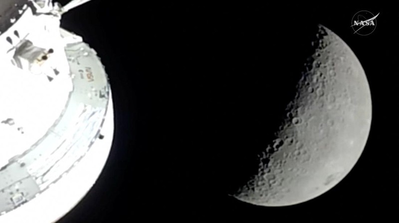 A view of the Moon and the Earth as the Artemis II mission's Orion spacecraft approaches to reach its furthest distance from Earth, in this screengrab taken from a livestream video on April 6, 2026. NASA/Handout via REUTERS    THIS IMAGE HAS BEEN SUPPLIED BY A THIRD PARTY.
